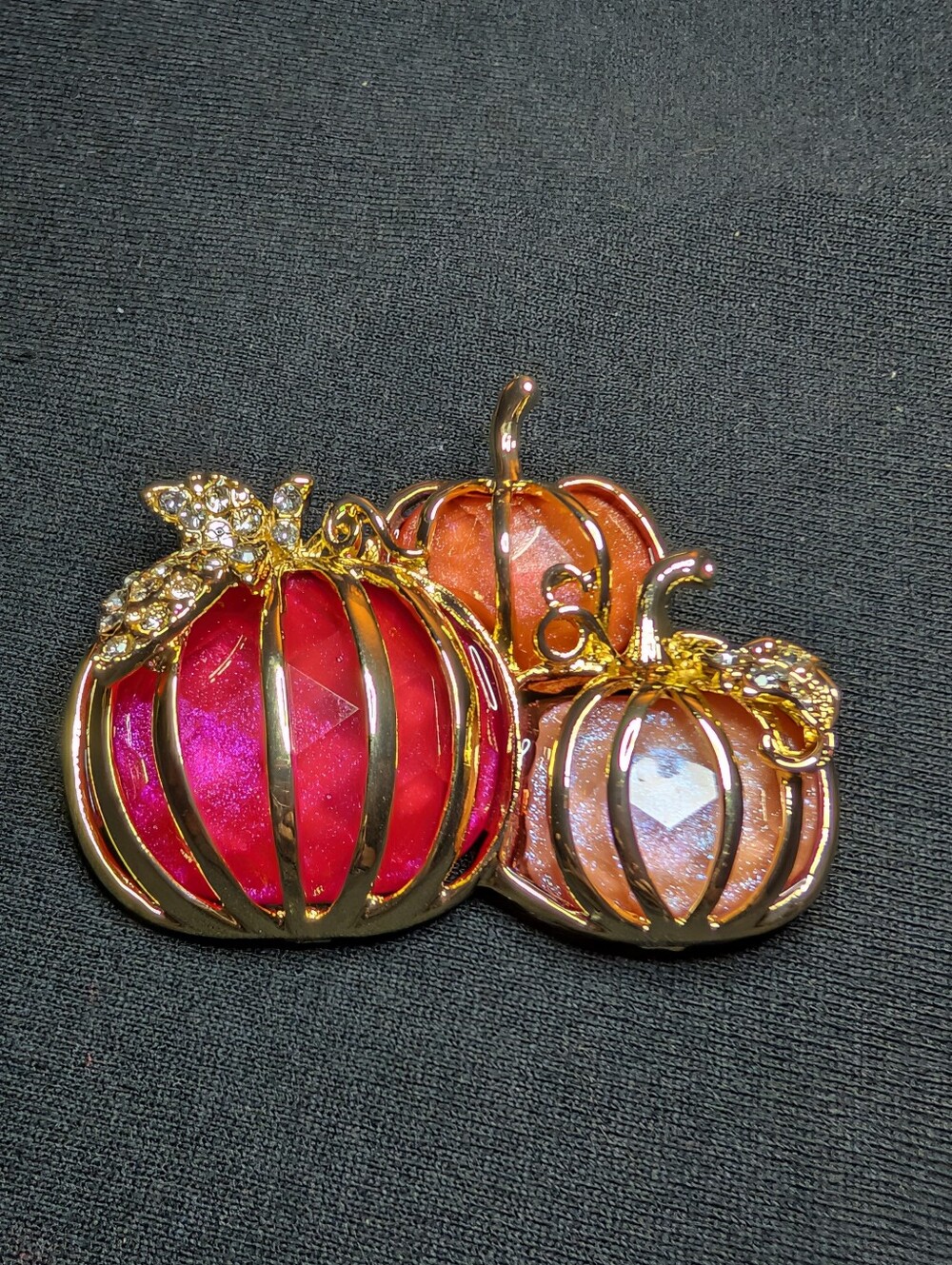 Gold-Tone Pumpkin Trio Brooch with Red and Peach Gemstones